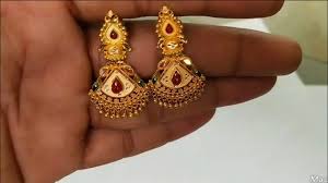 Make a stylish statement with our bold earrings in unique shapes with eclectic embellishments. Gold Earrings At Best Price In India
