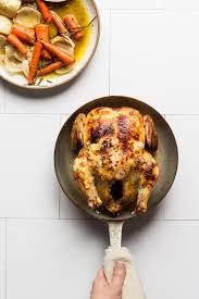 If you place the whole bird in the oven before it's fully. Upside Down Roasted Chicken Recipe Bessie Bakes