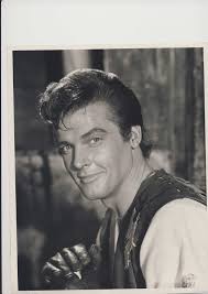 Roger Moore looking very beautiful with a beard.