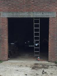 The most expensive option is laying several courses of blocks on top of frost footings, and then resting the edges of the slab on the blocks. Ace Garage Doors Norwich Norfolk Roller Doors Canopies Diy Electric