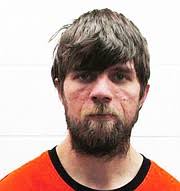 Man charged with drug possession after found asleep inside his vehicle