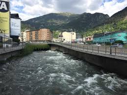 The Grand Valira River Is Raging In The Pyreneanmountain Principality Of Andorra From Its Spring Snowmelt Snow Still C Snow Melting Mountain Peak Travel