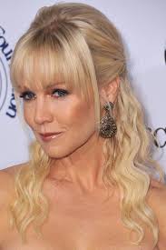 These medium length side bangs create the shape and texture of a shorter fringe by sweeping down and then out to long bangs can help to make your hair look sleek and elegant even when it's pulled back into a simple ponytail. 40 Cute Styles Featuring Curly Hair With Bangs