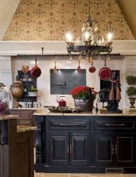 French Country Kitchen With Distressed Black Kitchen Cabinets Country Kitchen French Country Kitchen Black Kitchen Island
