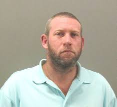 Barefoot felon charged with theft of pontoon boat, possession of gun, drugs 