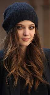 And More Updated Beanie Styles Are Surprisingly Feminine Looking With Long Hair Hair Styles Long Hair Styles Winter Hairstyles