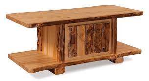 Designing and fabricating a wooden coffee and game table using old, reclaimed wood will create an instant conversation piece in your living room. Rustic Log Coffee Table With Storage From Dutchcrafters Amish