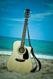 Guitar On The Beach A Guitar Left Standing On A Beach With The Gentle Waves Co Affiliate Guitar Left Guitar Beach Guitar Guitar Photography Beach