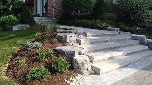 Natural stone steps are suited well for both front and backyard applications. Natural Stone Steps And Front Walkway Manor Landscaping