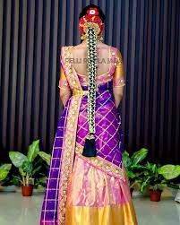 43 Indian Brides Who Mesmerised The World By Adding Jasmines To Their Hairdo The Gorgeous Bride Half Saree Designs Half Saree Function Bridal Silk Saree