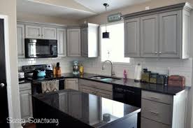 Black And Gray Kitchen Cabinets Black Appliances And White Or Gray Cabinets How To Make It Work Grey Painted Kitchen Kitchen Cabinets With Black Appliances Light Grey Kitchen Cabinets
