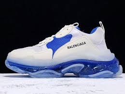 Deeply rooted in what's happening on the street, creative director demna gvasalia enters radical cool territory — trekking in a pair of triple s trainers. Balenciaga Triple S Clear Sole Trainers White Blue Balenciaga Sneakers Blue Balenciaga Shoes