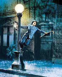 Why are there no raindrops in puddles during the title song scene in  Singin' In The Rain?