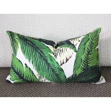 Pillows also provide endless opportunities to play with designs and palettes that do not currently exist inside your home. One Tropical Banana Palm Pillow Cover Leaves Outdoor Pillow Dark Green 12x20 20x20 22x22 Lumbar Hawaiian Green Zipper Palm Pillow Outdoor Pillows Pillow Covers