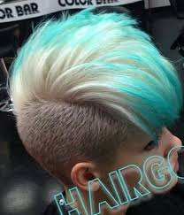 Give yourself the easiest hair makeover by adding hair highlights! Blonde And Turquoise Blue Dip Dyed Hair With Shaved Sides Dip Dye Hair Hair Styles Shaved Hair