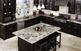 Natural white stone countertops are extremely popular nowadays for new kitchen design projects. Dark Kitchen Cabinets With White Granite Countertops Ideas 12 Photos Hackrea