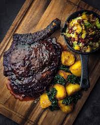 Flame Grilled Dark Forest Cote De Boeuf With Roast Inca Bella Potatoes And Crispy Cavolo Nero And Creamed Leeks Topped With Saute Food And Drink Food Rib Steak