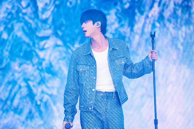 BTS's Jin drew strong attention during the group's three sold-out ARIRANG  concerts in Lima, Peru. During the shows, Jin wore local-inspired pieces  including a poncho and alpaca-style hat, while also