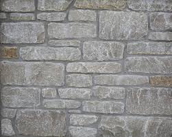 Greenstone split face stone veneer can enhance the aesthetic design of nearly any surface with its variety of rich natural colors and textures. Tumbled Splitface Veneer Monacelli Stone Company