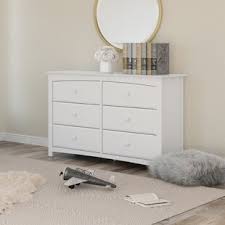 The wood grains and rich finishes add a natural harmony to a space. Cream Bedroom Dressers Birch Lane