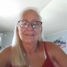 What is the species of fish with a bass mouth and bluegill body but bass  colors