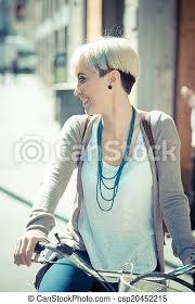 Hipster hair with handlebar mustache. Beautiful Young Blonde Short Hair Hipster Woman With Bike Beautiful Young Blonde Short Hair Hipster Woman Witk Bike In The Canstock