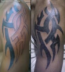 While most canvases walk away with tattoos t. Tattoo Of Tribal Arm