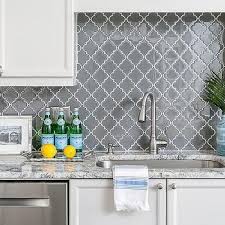 This sink does not come with a base. Charcoal Gray Moroccan Trellis Tiles With White Grout Grey Kitchen Walls Moroccan Backsplash Kitchen Decor