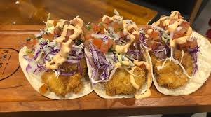Blackened fish, chile lime sauce, shredded cabbage mix, topped with pineapple relish. Japanese And Mexican Food Pair Deliciously At Krudos Sushi Modern Kitchen San Gabriel Valley Tribune