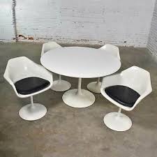 The swiveling tulip chair is covered in a sherpa upholstery, surrounding them in cozy style as they sit back. Tulip Style White Fiberglass Swivel Chairs And Table By Umanoff For Contemporary Ebay