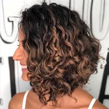 Angular fringe, textured fringe, high volume fringe and side swept fringe are ideal haircuts for naturally curly hair medium length. The Best Medium Length Naturally Curly Hairstyles Southern Living