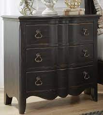 Serpentine drawer fronts and a scallop shaped base rail combine with an antiqued finish to create a relaxed vintage style full of personality in this nightstand. Chesapeake Antique Black 3 Drawer Bachelors Chest 1stopbedrooms