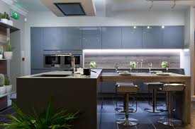 Formed Around A High Gloss Grey Cabinet Wall And Integrated Oven This Particular Kitchen Has Been Given A Conte Nobilia Kitchen Kitchen Design Unique Kitchen