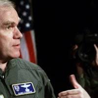 CPT Brian Udell, an F-15E pilot with the 366th Wing is shown carrying a  horse saddle to symbolize his return, i.e. back in the saddle, to the  cockpit of the waiting F-15