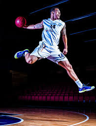 Basketball is a team sport in which two teams, most commonly of five players each, opposing one another on a rectangular court, compete with the primary objective of shooting a basketball (approximately 9.4 inches in diameter) through the defender's hoop (a basket 18 inches in diameter mounted 10 feet high to a backboard at each end of the court) while preventing the opposing team from shooting th. Donar Basketbal Basketball Photography Action Basketball Photoshoot Basketball Photography