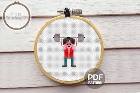 Download Boy Lifting Weights Cross Stitch Graphic By Crossstitching101 Creative Fabrica