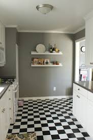 white kitchen tiles, black kitchens