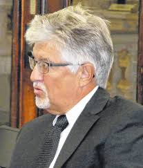 Who makes the security policy for Clinton County Courthouse?