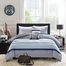 The dark grey and black accent colors help to outline the oversized floral pattern and are used in the matching. D H 4 Piece Boys Navy Blue White Grey Stripes Comforter Twin Twin Xl Set Horizontal Gray Striped Bedding Rugby Stripe Sports Themed Nautical Pattern Modern Lines Pattern Dorm College Polyester Buy Online In