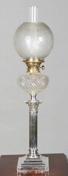 A victorian kerosene banquet lamp, the brass corinthian column supporting an apricot glass oil reservoir, with chimney and an etched globe shade, height 84 cm. Antique Lighting Oil Lamps Page 1 Antiques Co Uk