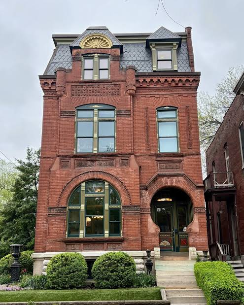Classic 1920s St. Louis red brick craftsmanship in South City., AI generated