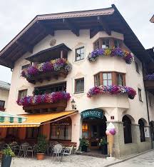 Read this poem in other languages. No One Does Window Box Flowers Quite Like The Austrians