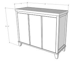 Diy pull out laundry hamper. Diy Tilt Out Laundry Hamper Cabinet Free Building Plans And Video