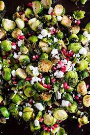 Roasted Brussels Sprouts With Pomegranate Seeds And Goat Cheese Recipe Pomegranate Seeds Recipe Pomegranate Recipes Sprout Recipes