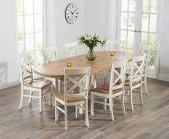 A little warmer than stark white, this lush color invites guests to take a seat. Chelsea Oak Cream Extending Dining Table With Cavendish Chairs
