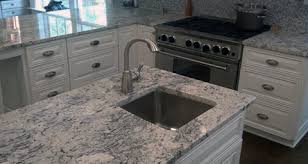 The beautiful white granite looks like marble without the required maintenance commonly needed to care for and protect. White Ice Granite