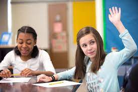I will silently wait until the student stops talking. Centerschool Student Raising Hand Center School