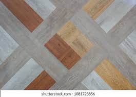 Patterned lino flooring patterned and hexagon vinyl flooring have been a popular and affordable option since the early 1900s, truly showing how these floors have withstood the. Wooden Texture Patterned Vinyl Floor Background Stock Photo Edit Now 1081723856