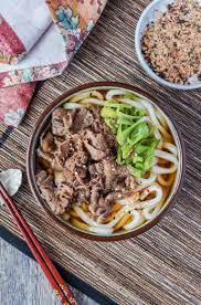 Recipe For Niku Udon A Japanese Noodle Soup With A Seasoned Dashi Base Thick Udon Noodles And Thinly Sliced And Marinated Udon Recipe Udon Noodles Beef Udon
