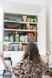 Love the design ideas in this stunning black and white kitchen! How To Organize Your Kitchen Cabinets And Pantry Feed Me Phoebe